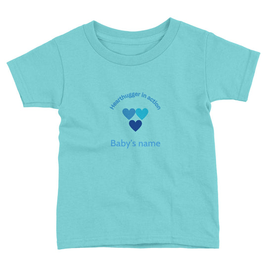 b4bc23a1-6d26-4a20-bb52-2ca54cb791b5 Toddler t-shirt with 'Hearthugger in Action' design, customizable with name on front, 'Loved by all' on the back." Sizing Chart: "Size chart for a toddler t-shirt with measurements in inches and centimeters."
